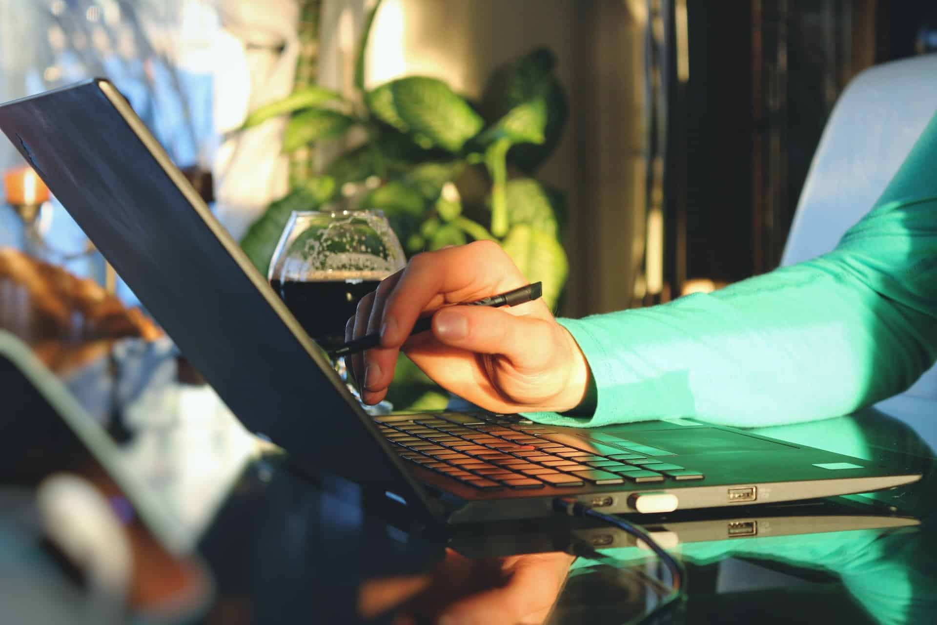 Person typing on laptop